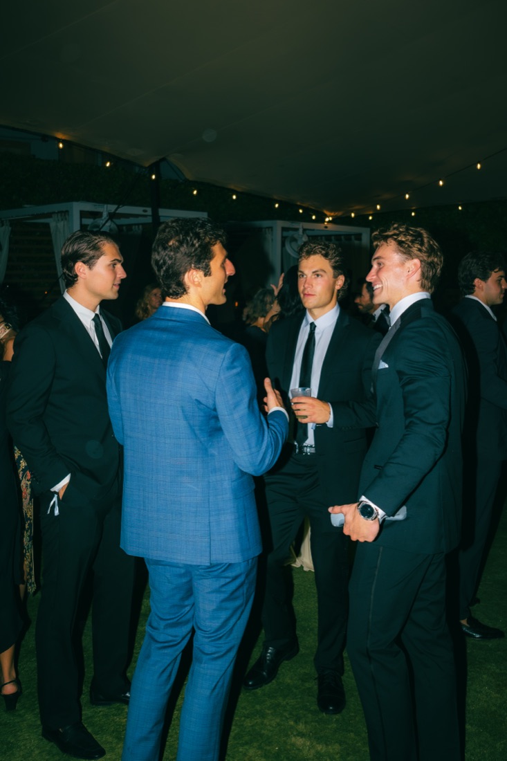 Founders in conversation on the lawn