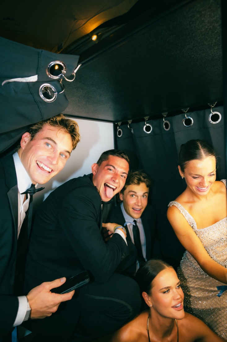 A group laughing at the bar