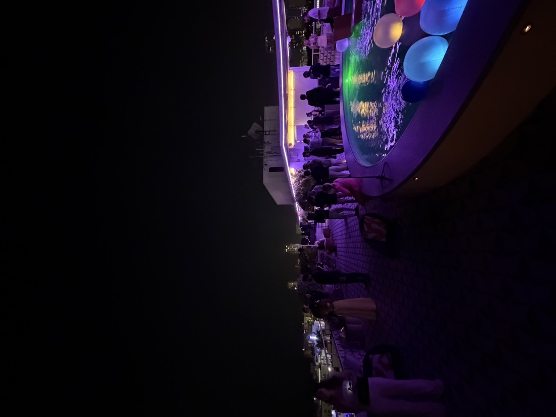 The Miami NARTY around a rooftop pool at night